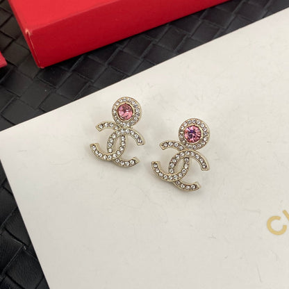 Boucles d'oreilles en strass roses