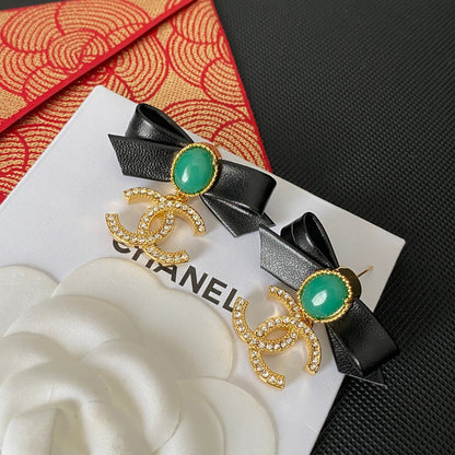 Boucles d'oreilles nœud papillon en cuir tendance