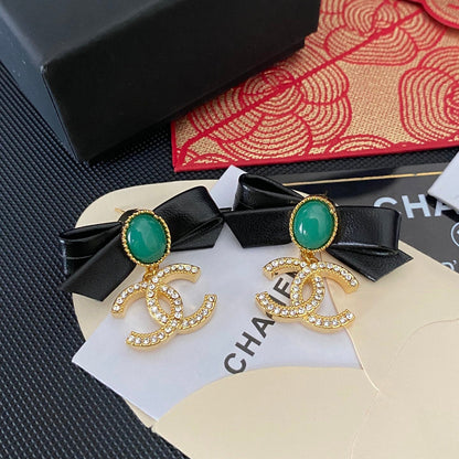 Boucles d'oreilles nœud papillon en cuir tendance