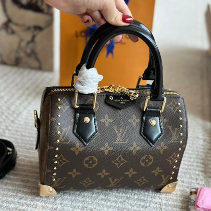 Bolso de mano Rivet