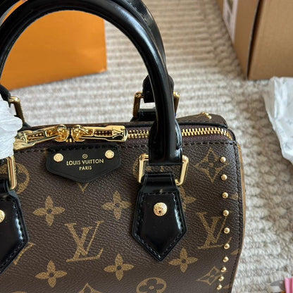 Bolso de mano Rivet