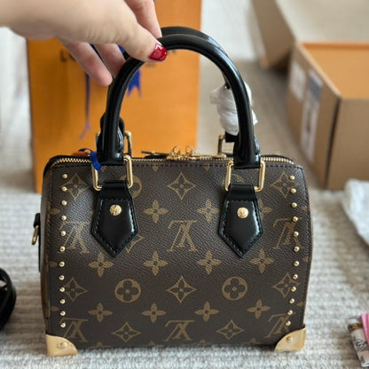 Bolso de mano Rivet