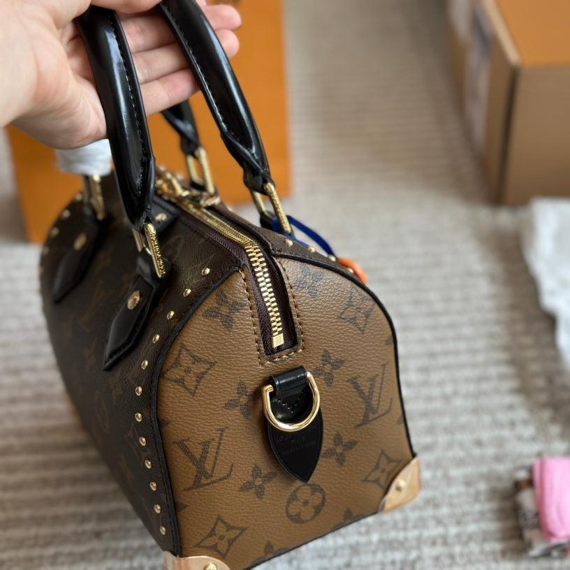 Bolso de mano Rivet
