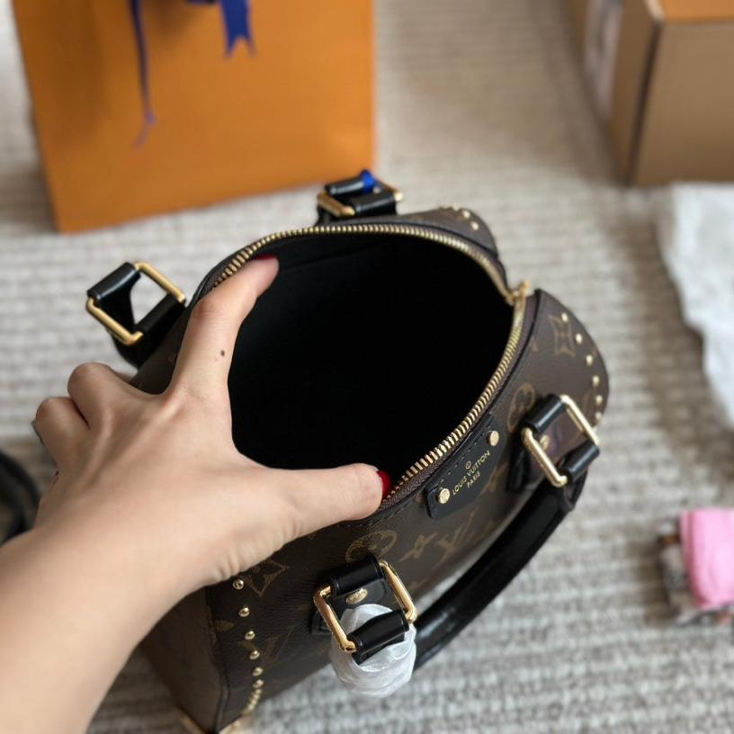 Bolso de mano Rivet