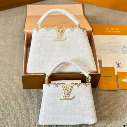 Bolso Capucines blanco de piel con diseño de cocodrilo