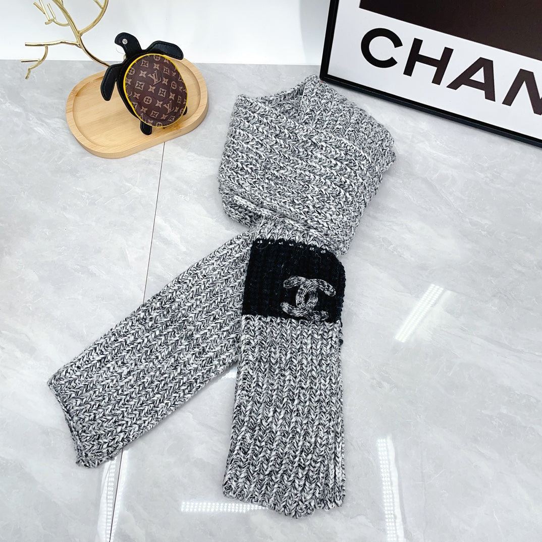 Conjunto de gorro y bufanda de punto a la moda