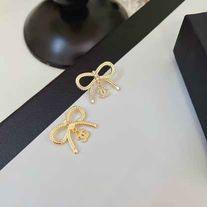Boucles d'oreilles nœud papillon mignonnes et tendance
