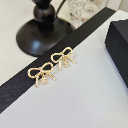 Boucles d'oreilles nœud papillon mignonnes et tendance