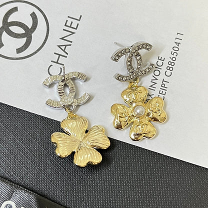 Boucles d'oreilles pendantes élégantes avec logo floral