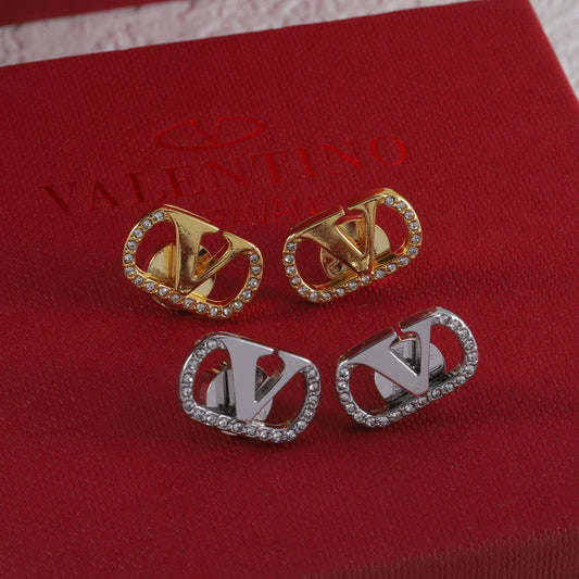 Boucles d'oreilles clous vintage en forme de V sertis de diamants