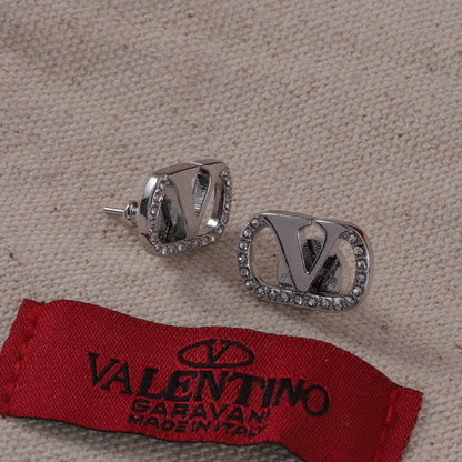 Pendientes de botón en V con diamante vintage