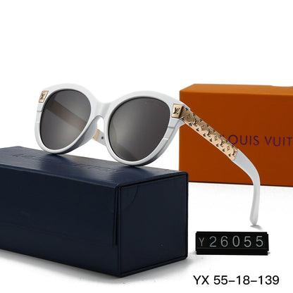 Gafas de sol redondas con montura metálica repujada vintage