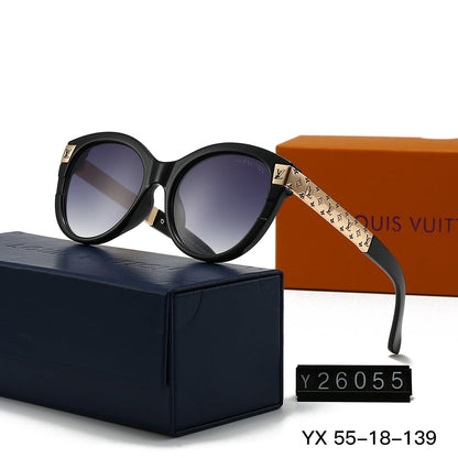 Gafas de sol redondas con montura metálica repujada vintage