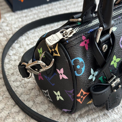 Sac nœud noir gaufré et coloré