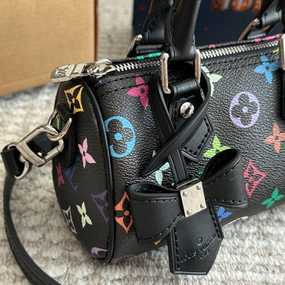 Sac nœud noir gaufré et coloré