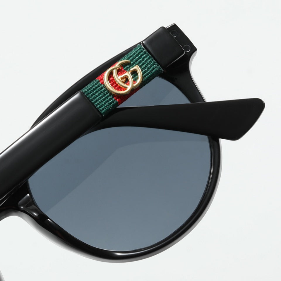 Gafas de sol retro de punto ovaladas a rayas