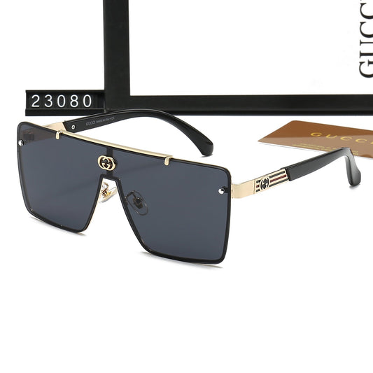 Lunettes de soleil tendance à monture rayée et design monobloc