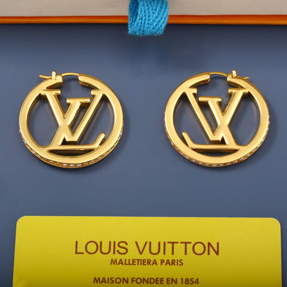 Boucles d'oreilles lettre fantaisie