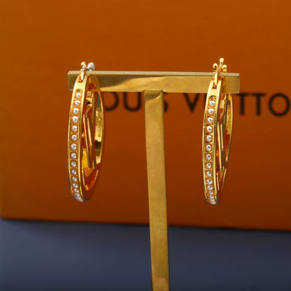 Boucles d'oreilles lettre fantaisie